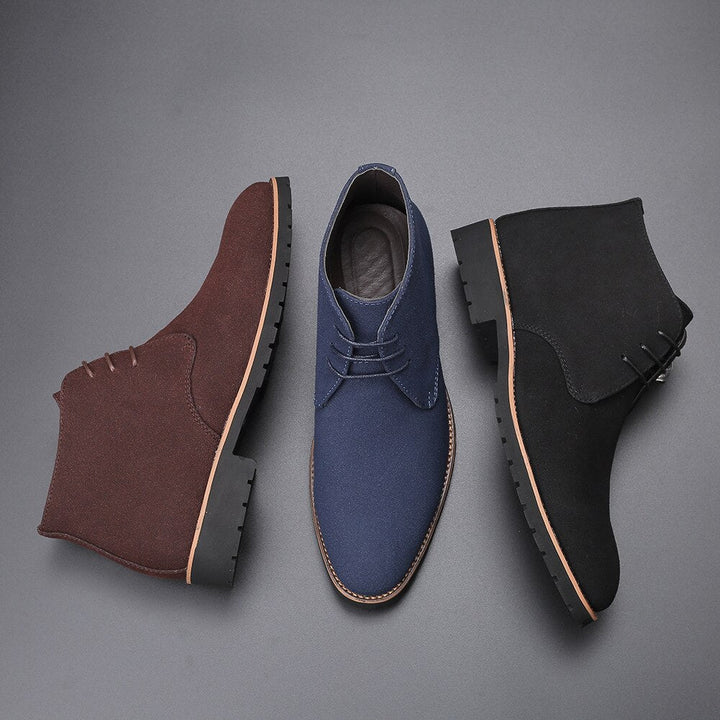 Comfortable men's brown slip-on ankle boots. Perfect for casual wear & versatile everyday style.