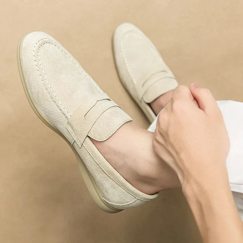 Beige men's slip-on loafers. Elegant design for comfortable, stylish formal & casual men's fashion footwear.