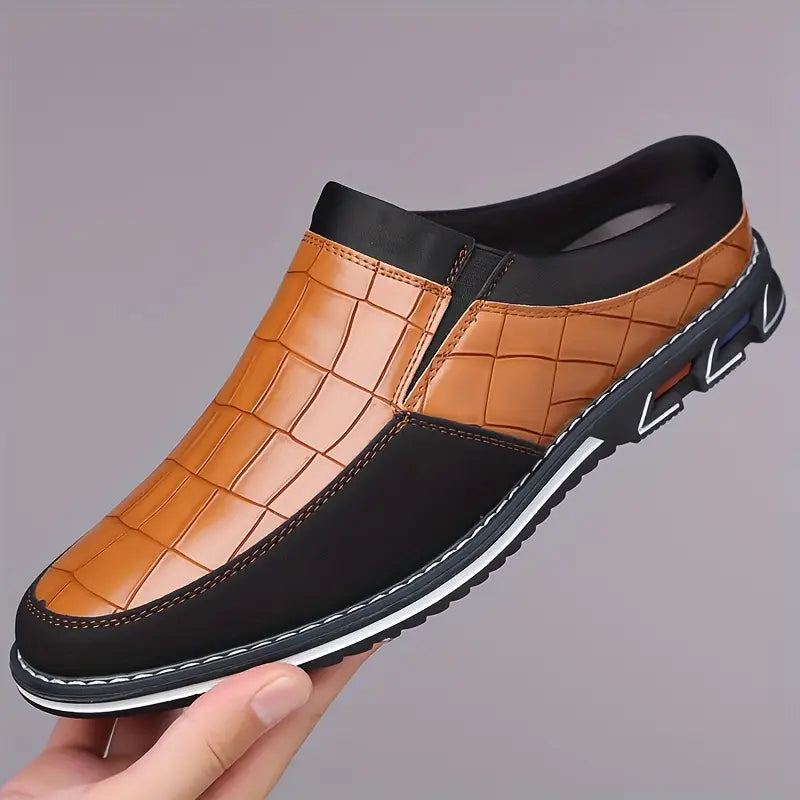 Premium comfort men's slip-on mules, great for versatile everyday styling and ease.