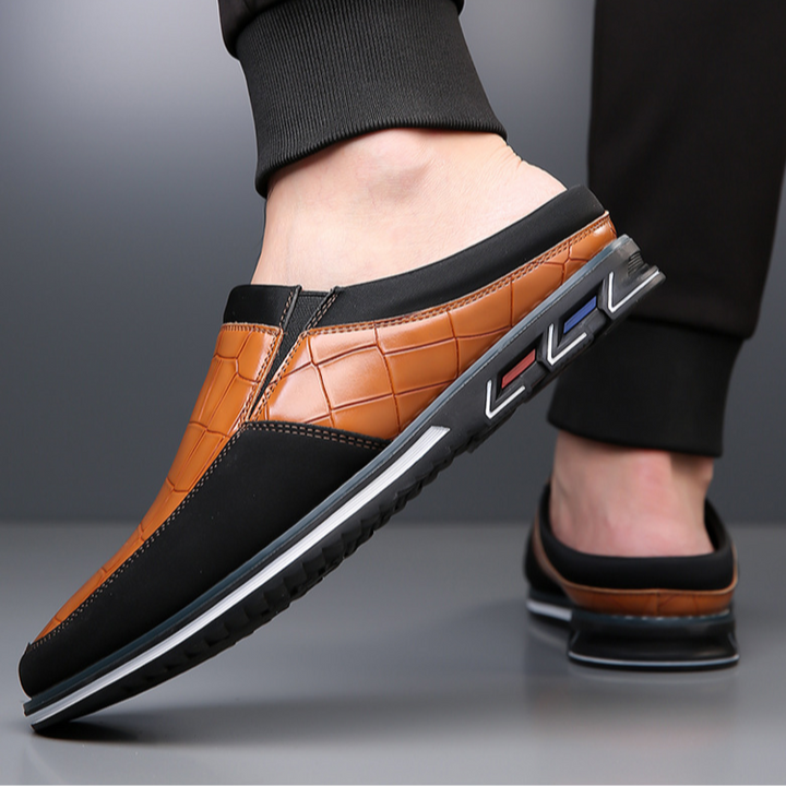 Fashion-forward men's mules, easy slip-on footwear for stylish comfort and versatility.