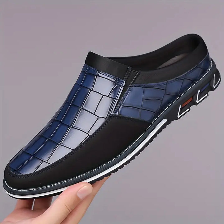 Effortless men's comfort mules, slip-on design with a touch of modern style and ease.