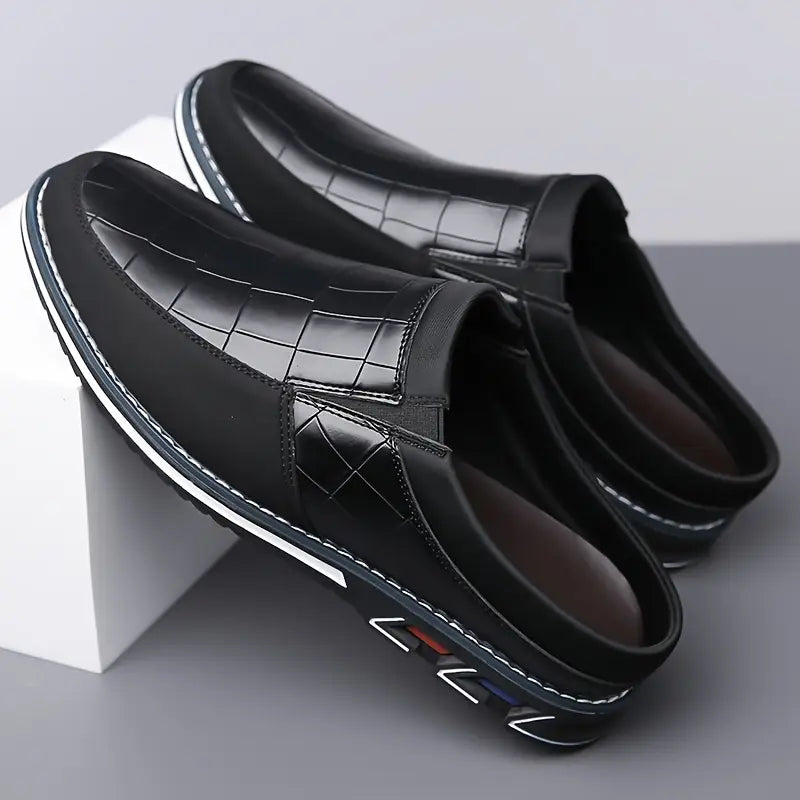 Comfortable men's slip-on mules, perfect casual footwear for versatile styling.