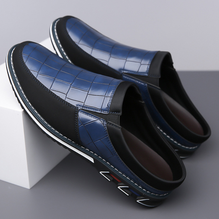 Modern men's fashion mules, providing slip-on convenience and excellent comfort.