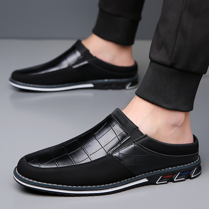 Premium men's slip-on mules, ideal comfort footwear for sophisticated everyday fashion.
