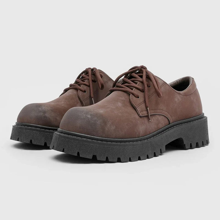 Men's stylish black thick-sole Derby shoes, perfect for urban fashion & smart casual outfits.