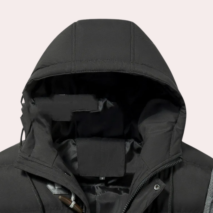 Insulated men's warm winter jacket, perfect for cold weather. A stylish addition to any men's fashion.