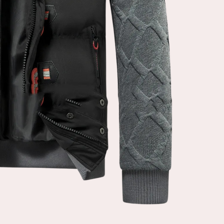 Durable men's black winter jacket, designed for ultimate comfort & warmth in outdoor and urban fashion.