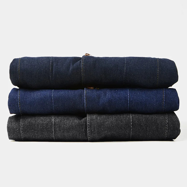 Durable men's blue denim jacket with a modern fit, a stylish casual outerwear piece for everyday fashion.