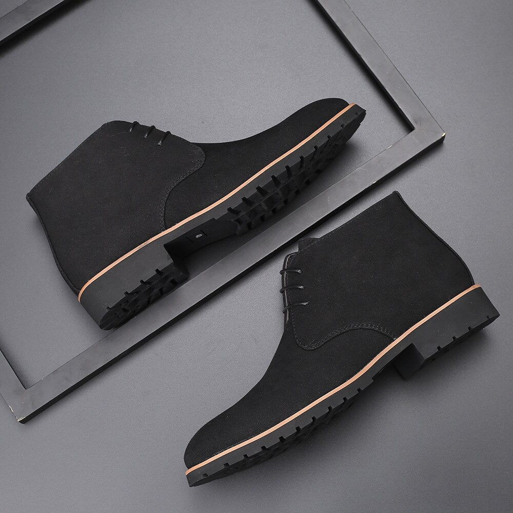 Trendy men's ankle boots for spring. Casual slip-on footwear, offering everyday comfort & stylish men's fashion appeal.