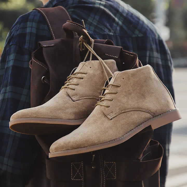Men's stylish brown Chelsea boots, rugged design for all-day comfort, versatile casual & dress footwear.