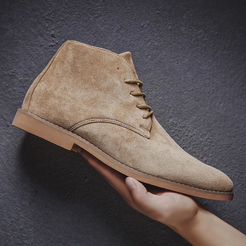 Rugged men's stylish brown Chelsea boots, ideal for both casual outfits and semi-formal dress wear.