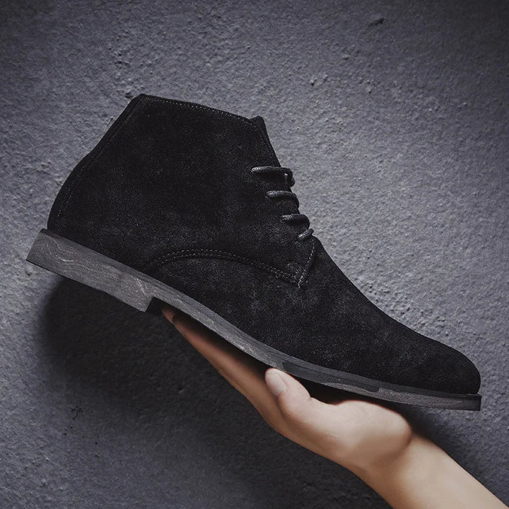 Comfortable men's black Chelsea ankle boots, offering stylish support and a durable, everyday design.