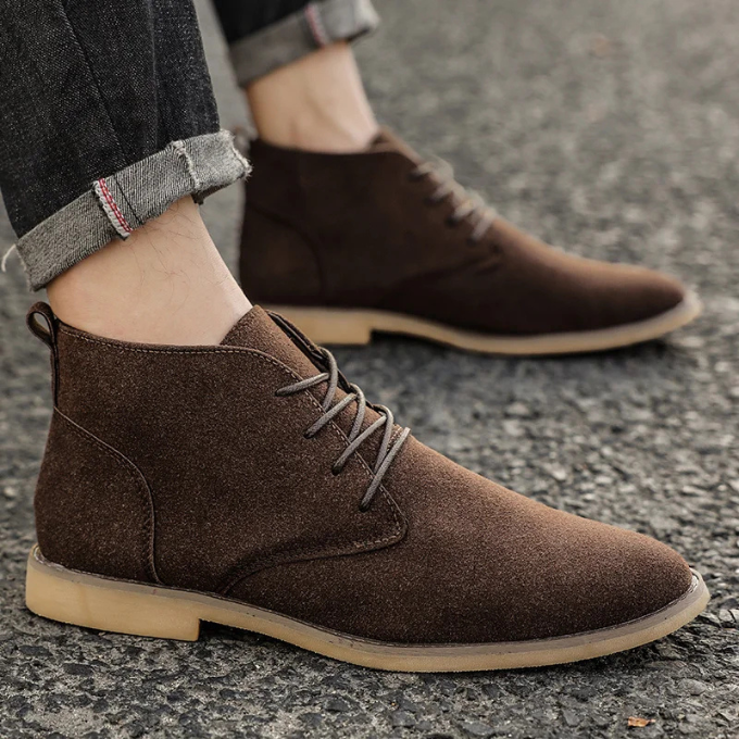Lightweight men's chukka boots in a neutral tone, offering comfort & style for everyday casual wear.