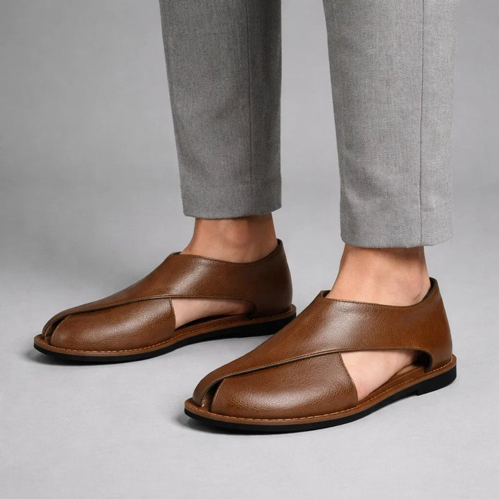 Comfortable men's cross-strap sandals, ideal warm weather footwear for everyday wear.
