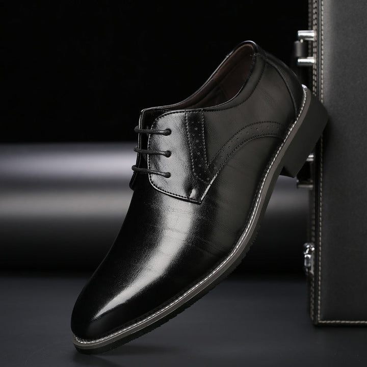 Men's stylish brown leather brogue lace-up dress shoes, perfect for formal and business casual attire.