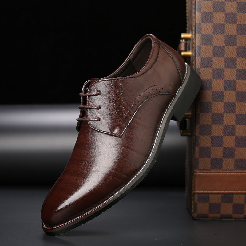 Classic black leather brogue lace-up shoes with intricate detailing, ideal for weddings and formal events.