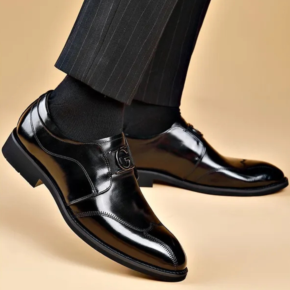 Sophisticated men's black suede slip-on loafers, offering a comfortable and stylish look for daily wear.