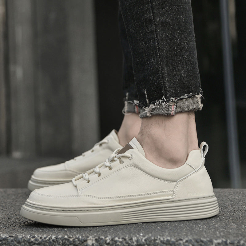 Men's comfort footwear: brown low-top sneakers with traction outsole for daily wear.