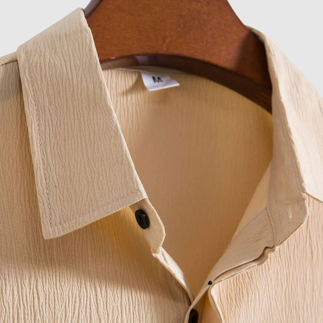 High-quality men's button-down shirt, long sleeve, a wardrobe staple for casual to formal outfits.