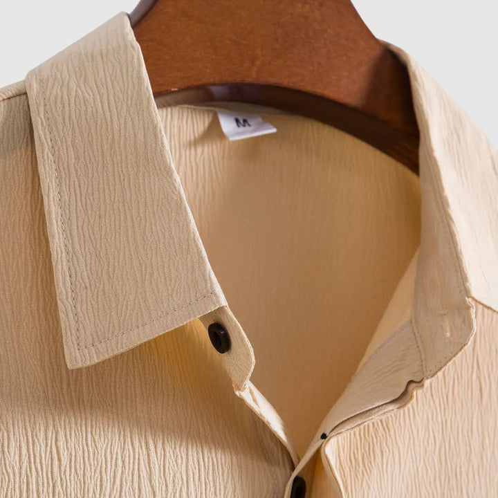 High-quality men's button-down shirt, long sleeve, a wardrobe staple for casual to formal outfits.