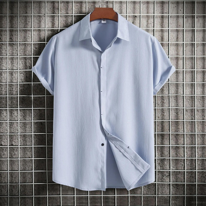 Elegant men's long sleeve button-down shirt, perfect for smart casual & business events.