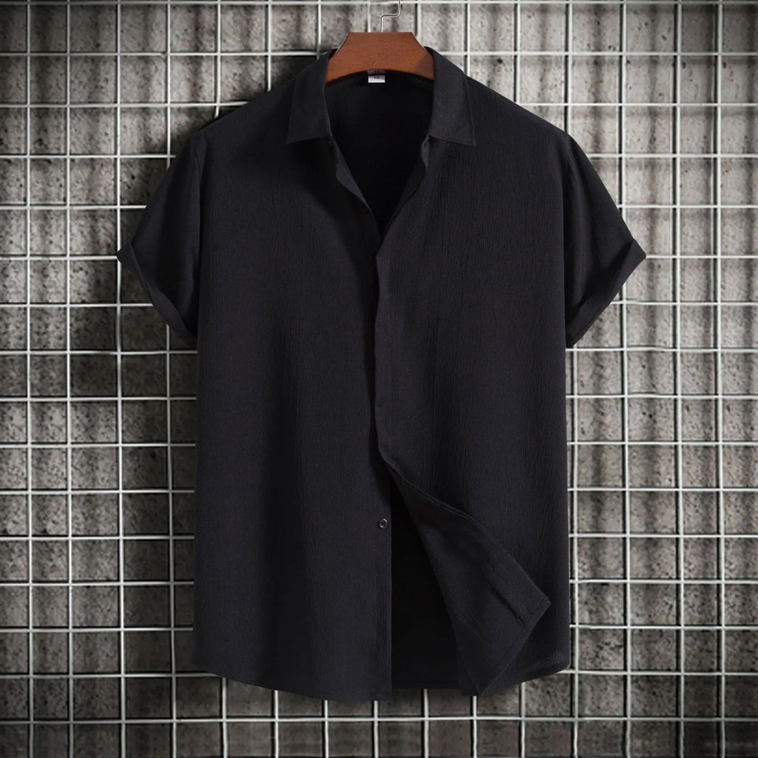 Versatile men's button-down shirt for any occasion, from casual to formal wear.