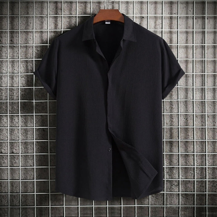 Versatile men's button-down shirt for any occasion, from casual to formal wear.