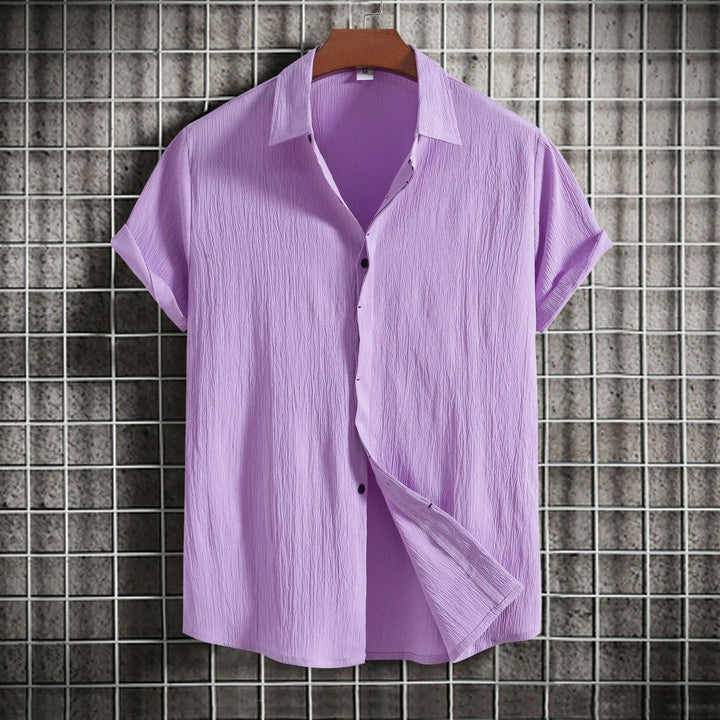 Modern fit men's button-down shirt, long sleeve, classic style for versatile looks.
