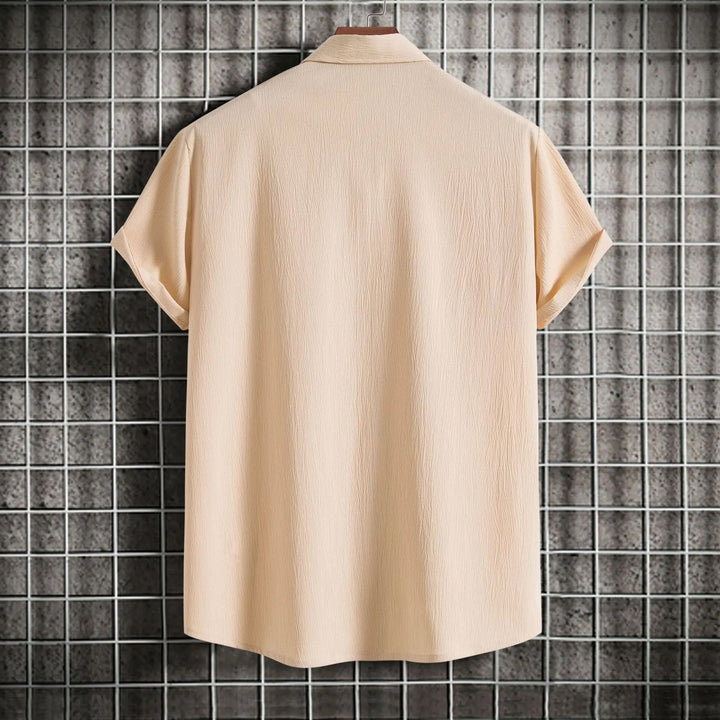 Front view of a men's stylish button-down shirt, long sleeve, suitable for various dress codes.