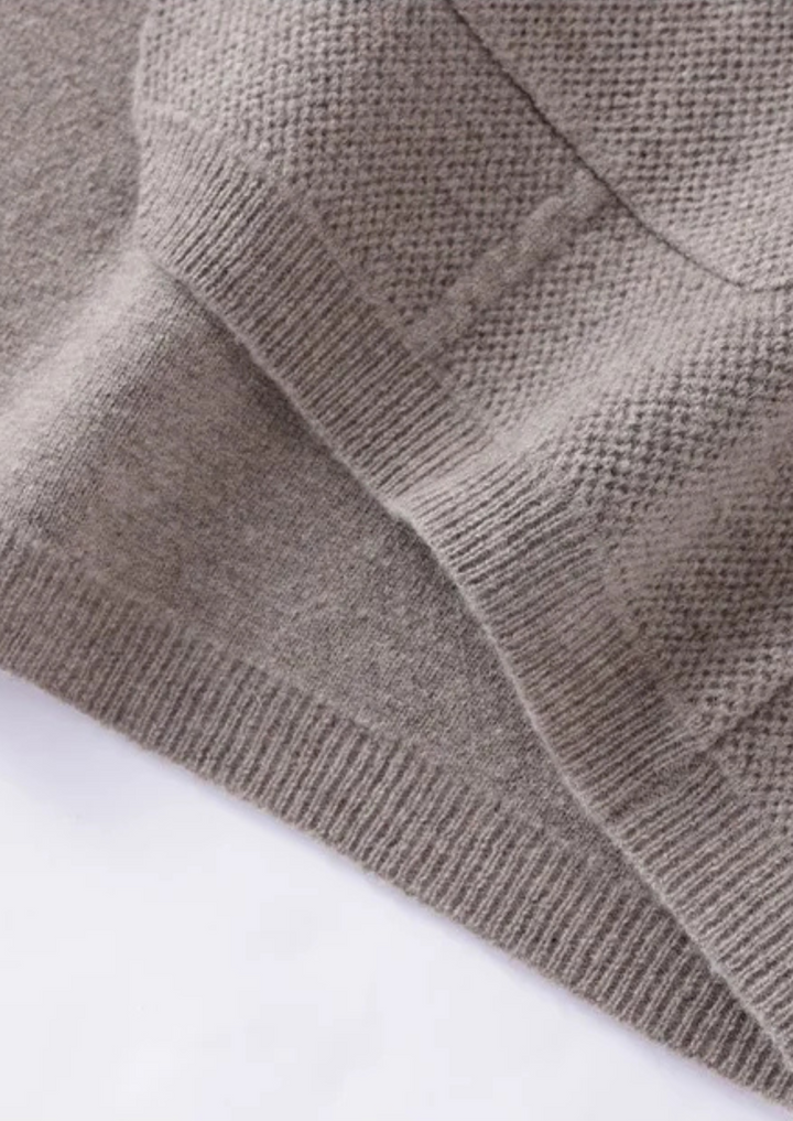 All-season men's versatile button-up cardigan sweater, great for casual or smart casual layering.