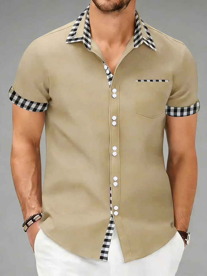 Tailored fit men's long sleeve checkered button-up shirt. Ideal for a modern, smart casual look.