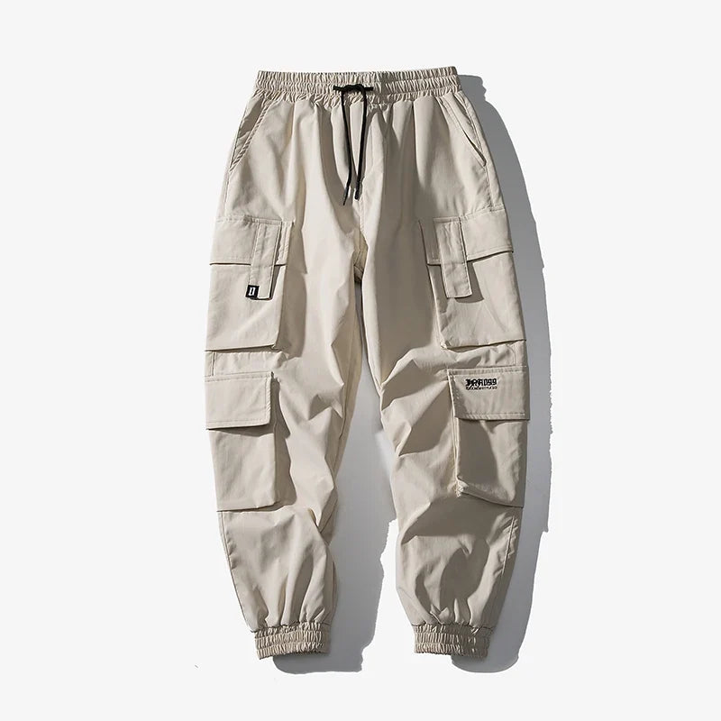 Comfortable men's cargo joggers featuring an elastic waist, ideal athletic bottom for casual or active wear.