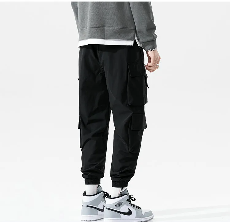 Versatile men's fashion cargo joggers, an athletic bottom for casual wear, active use, and street style.