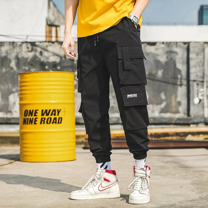 Soft, comfortable men's cargo joggers with an elastic waist, perfect for stylish urban fashion.