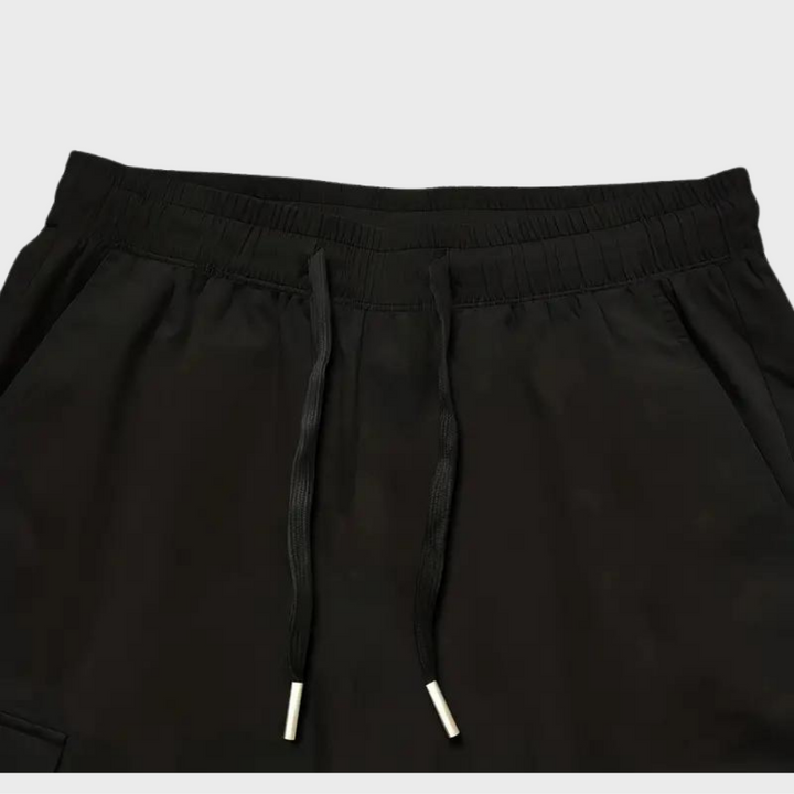 Full-length view of men's stylish cargo pants in a modern relaxed fit.
