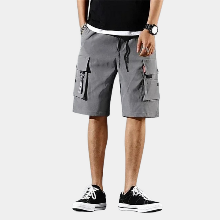 Trendy men's cargo shorts featuring spacious pockets, designed for ultimate comfort and utility.