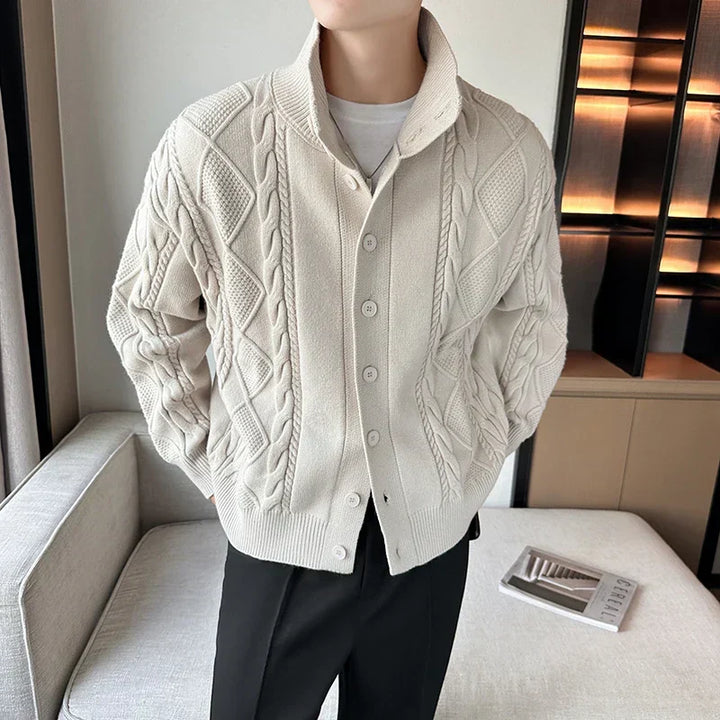 Chunky men's cable knit cardigan with button-front closure, offering stylish and warm casual layering.