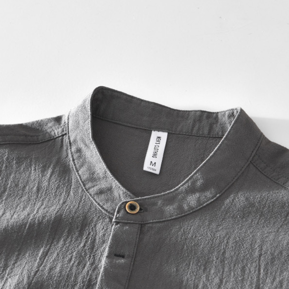 Men's versatile collarless long sleeve popover shirt, breathable for stylish spring & summer.
