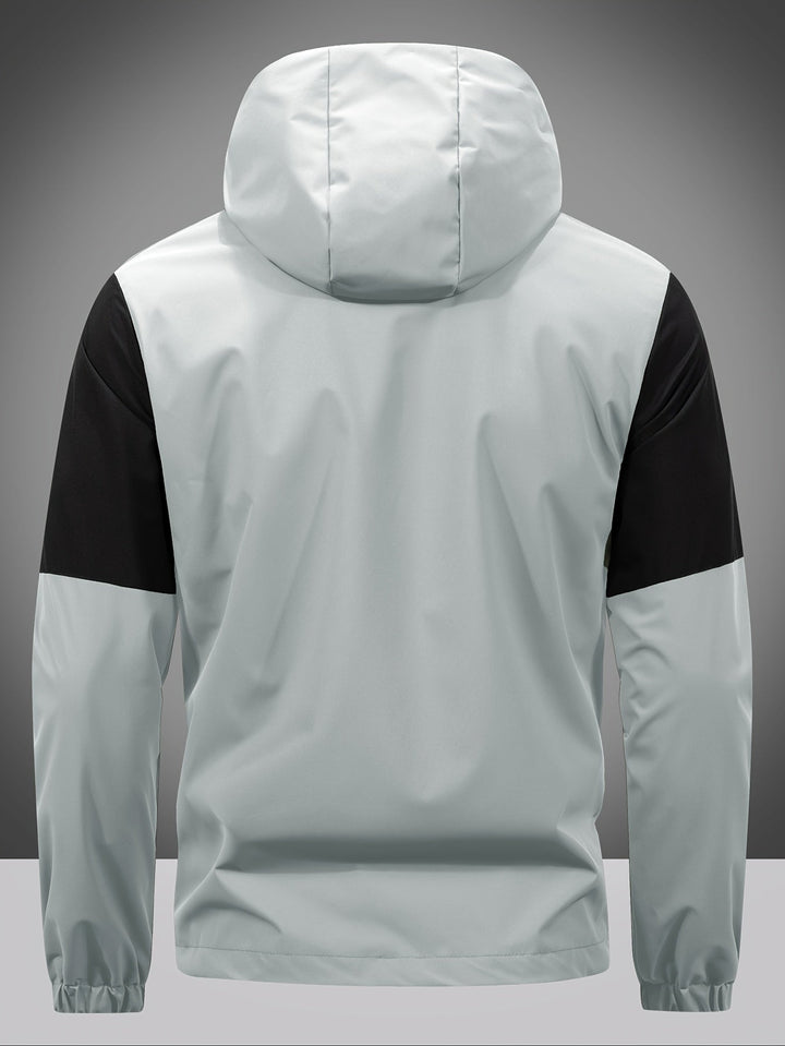 Modern men's color block hooded jacket, a lightweight and stylish zip-up windbreaker for outdoor activities.