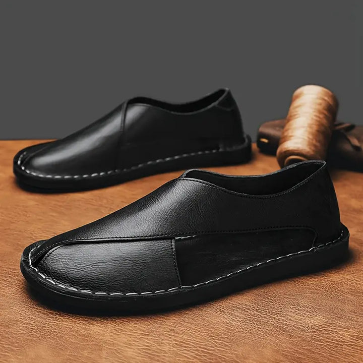 Men's comfort cross-strap sandals providing support & style during summer casual walks.