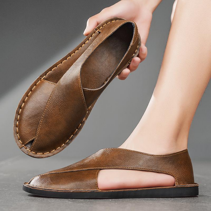 Durable men's comfort cross-strap sandals, premium footwear for active summer days.