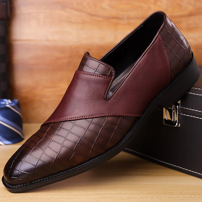 Black croc-pattern men's loafers: Sophisticated slip-on dress shoes, ideal for formal fashion and business casual.
