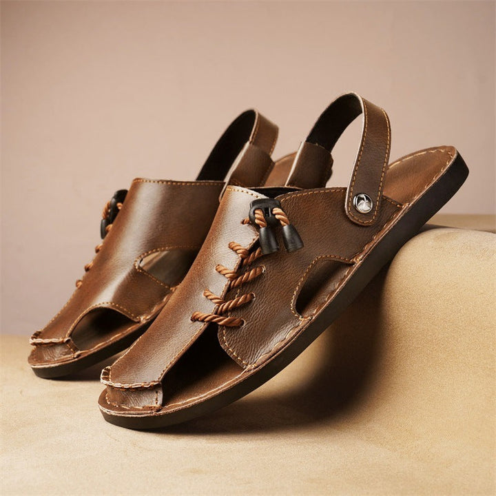 Slip-on men's cross-wrap comfort sandals with adjustable strap, ideal for vacation and summer fashion.
