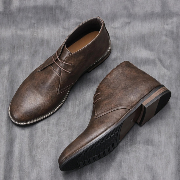 Durable men's dark brown leather boots, stylish and comfortable for everyday casual wear.