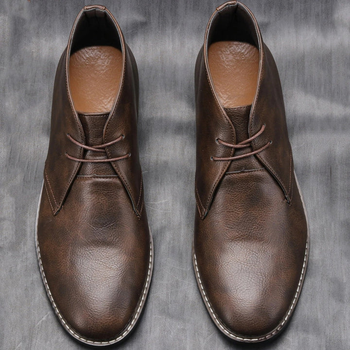 Comfortable and rugged dark brown leather boots, a stylish men's footwear choice for everyday.