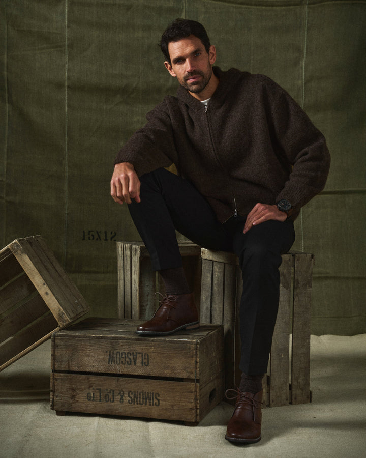 Durable men's dark brown leather boots, designed for everyday wear and lasting comfort.