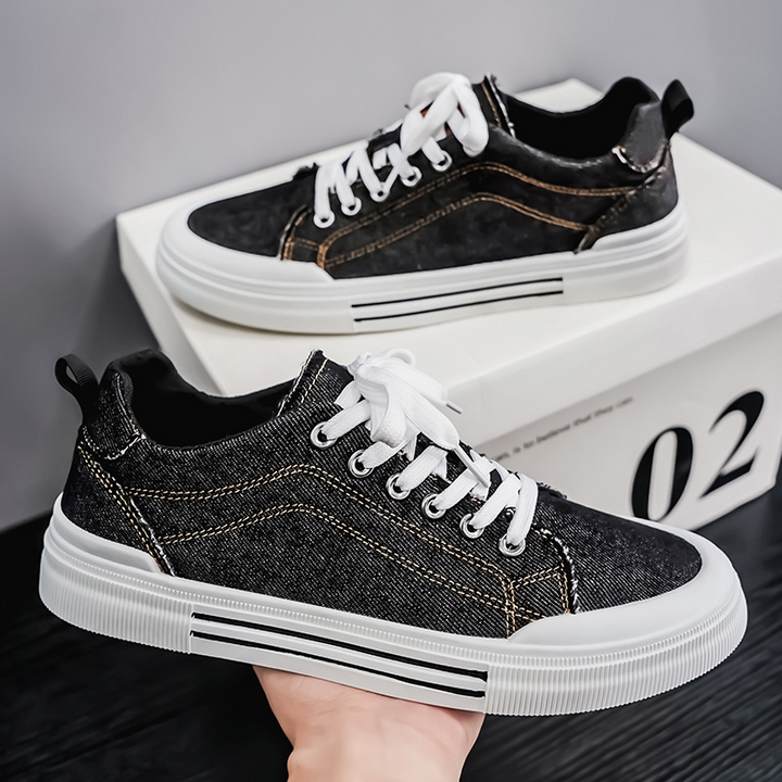 Stylish men's denim sneakers with secure laces for casual, comfortable daily wear.