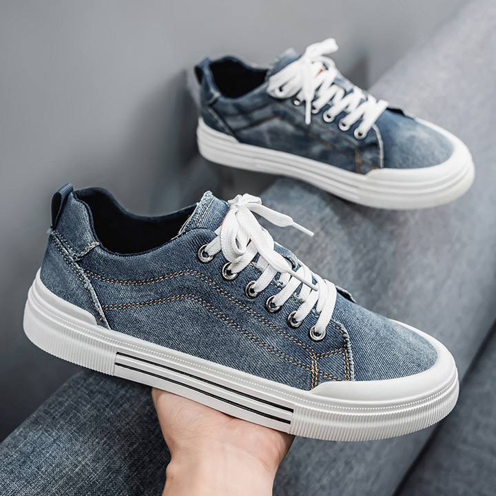 Textured men's denim sneakers, blending modern street style with casual comfort.