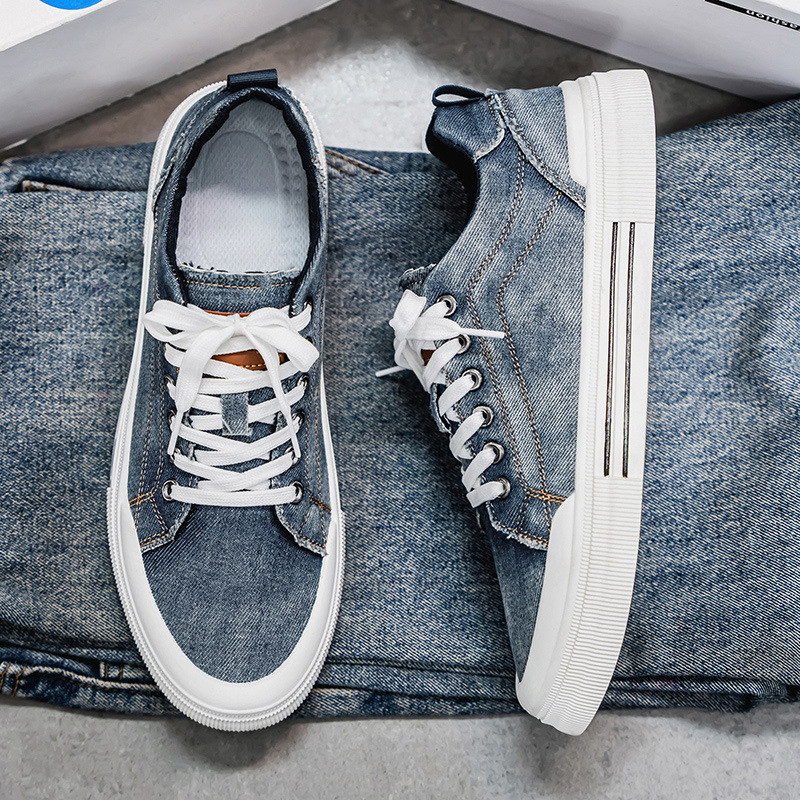 Close-up of trendy men's denim sneakers, showcasing durable casual footwear.