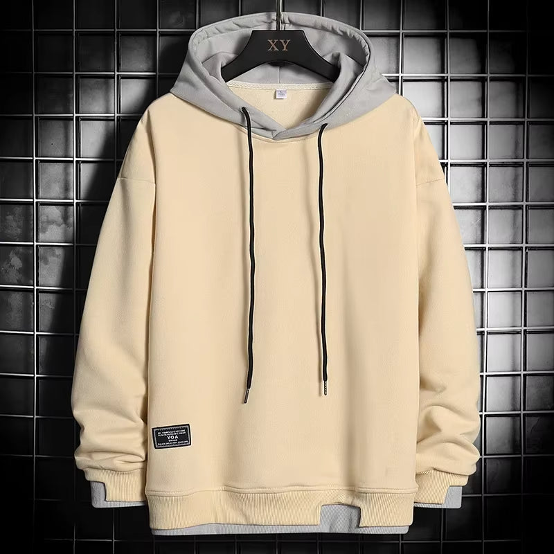 Comfortable men's dual-tone pullover hoodie. Features a unique layered hem for a stylish, modern casual look.